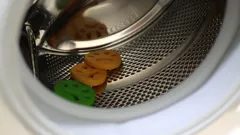 Detail tlačítek sušičky prádla